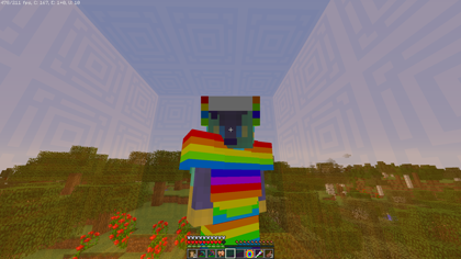 Front third-person view. The viewer is in a box made of translucent orange blocks. The viewer is wearing rainbow armor and its hotbar contains a rainbow pickaxe, a rainbow wand, and a circular rainbow item.